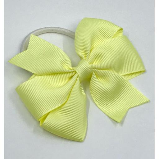 Small 3 inch Baby Maize Pinwheel Bow on White Snagfree Elastic